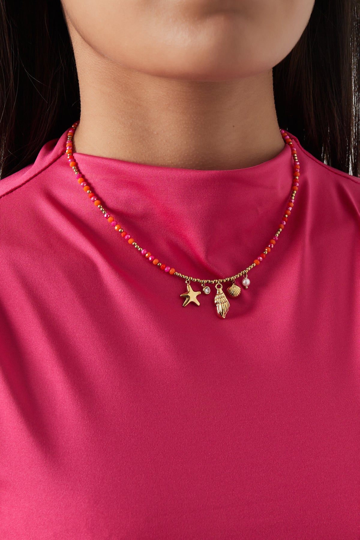 Ketting met ster en schelpen goud