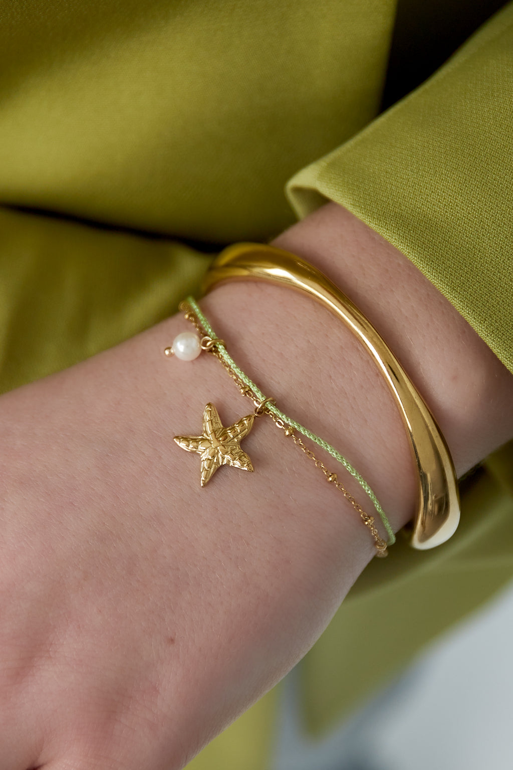 Armband zeester goud