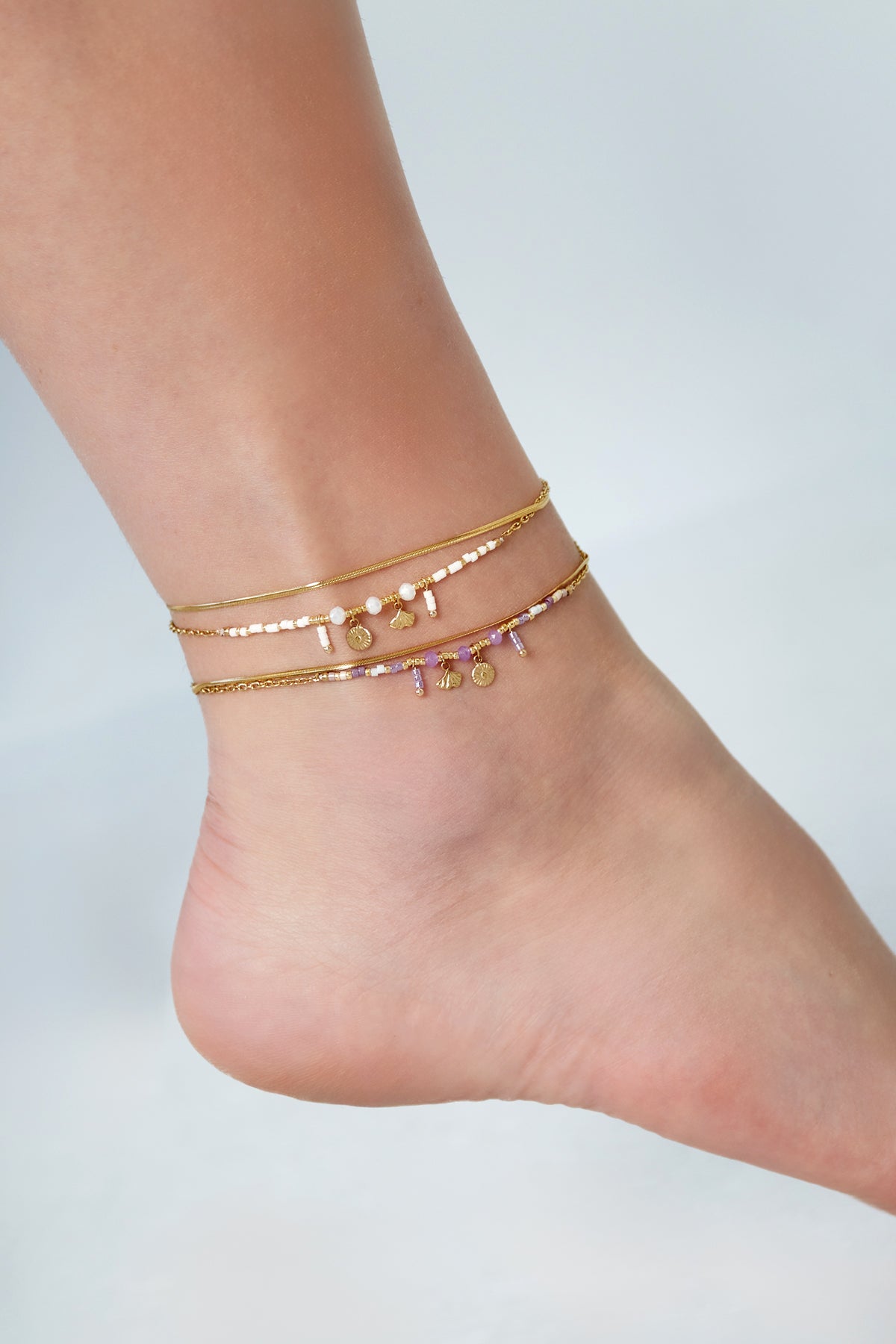 Enkelbandje met hangertjes goud