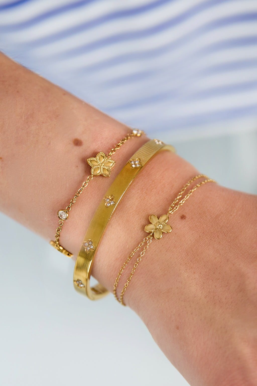 Armband dubbel bloem goud