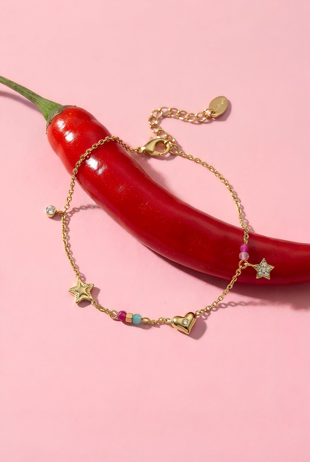 Armband hartje en sterretjes goud