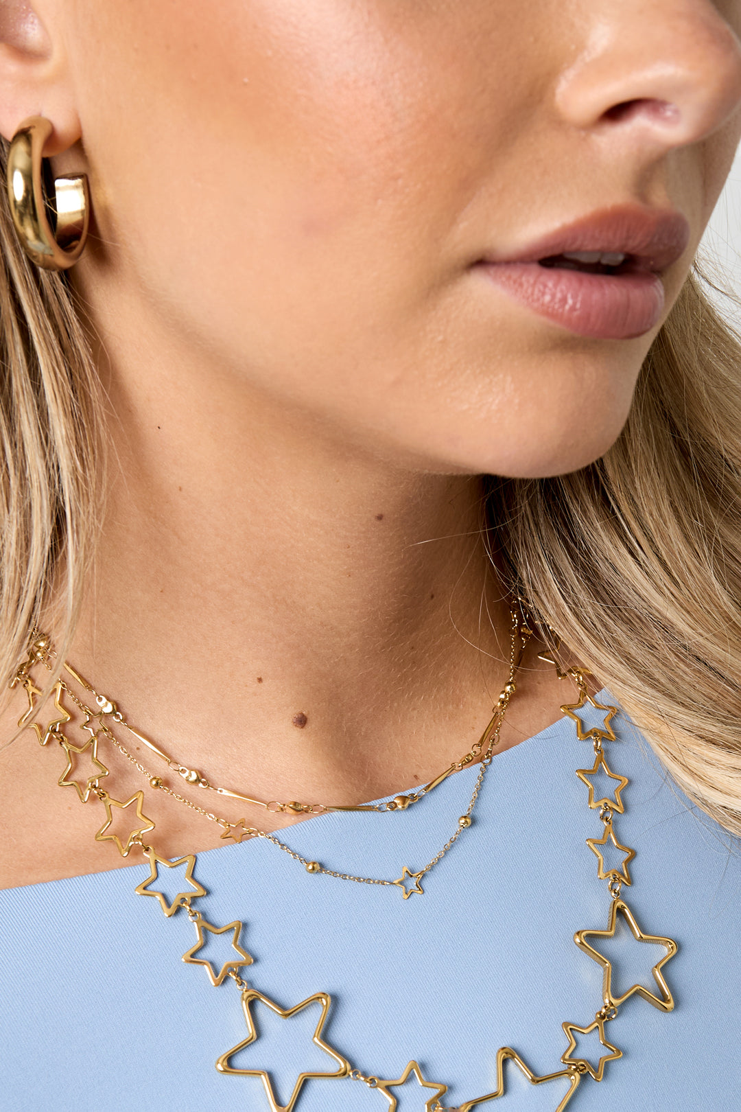 Ketting met sterretjes goud