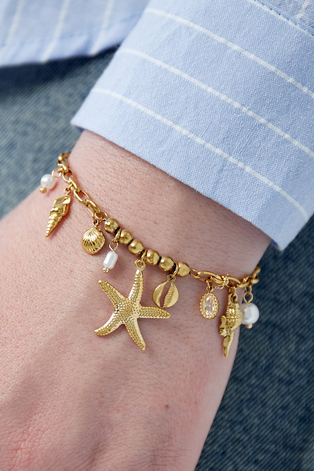 Armband met hangertjes goud